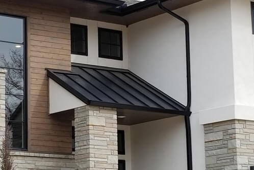 Standing Seam Roof over a house door